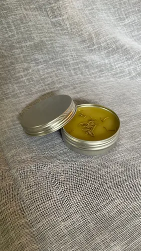 Original customer photo of a balm tin